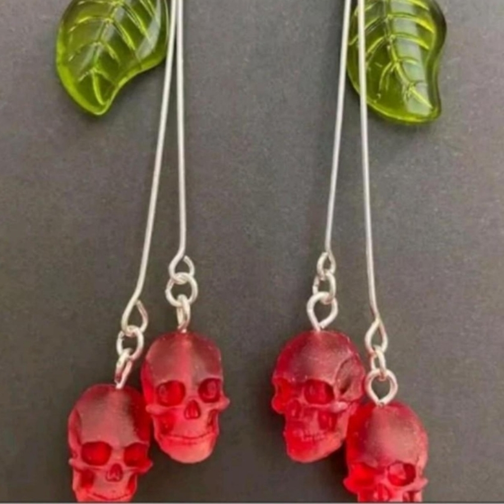 Red Skull Earrings with Green Leaf Accents